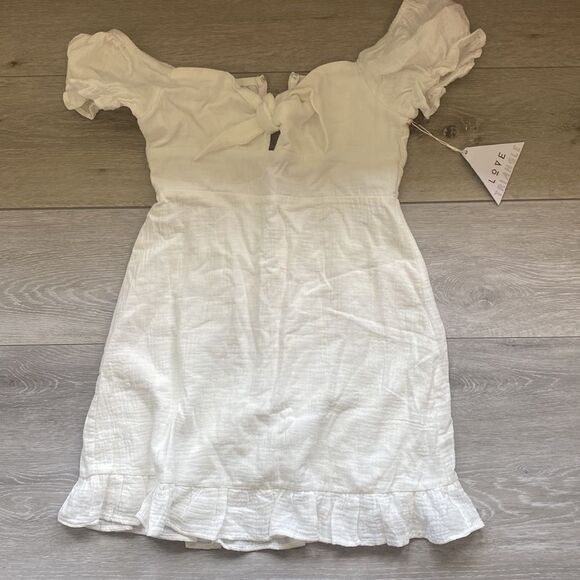 LOVE TRIANGLE
SWEET SENSATION TIE FRONT S/S MINI DRESS WHITE M NWT - Picture 5 of 8